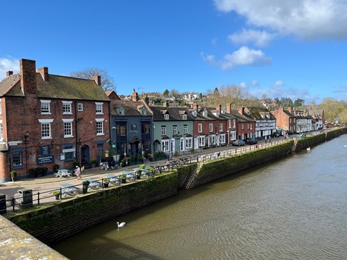 terraced buildings along a riverside