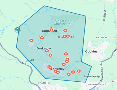 high level map of village showing outlined boundary area with red dots where properties are for sale