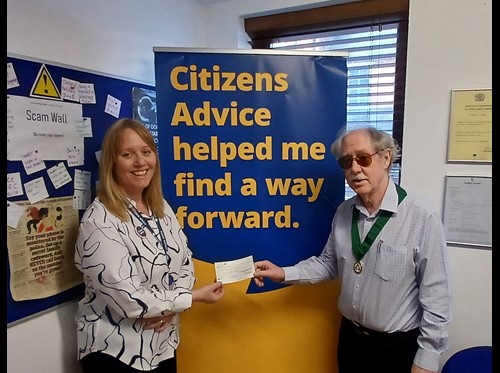 Chairman of the council handing over a cheque for funds raised to the Wyre Forest CAB CEO