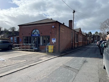 long low red brick building